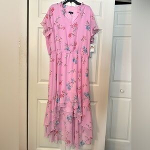 Brand new pink flowered 1 state hi lo dress. Beautiful pink flowered design. 3x